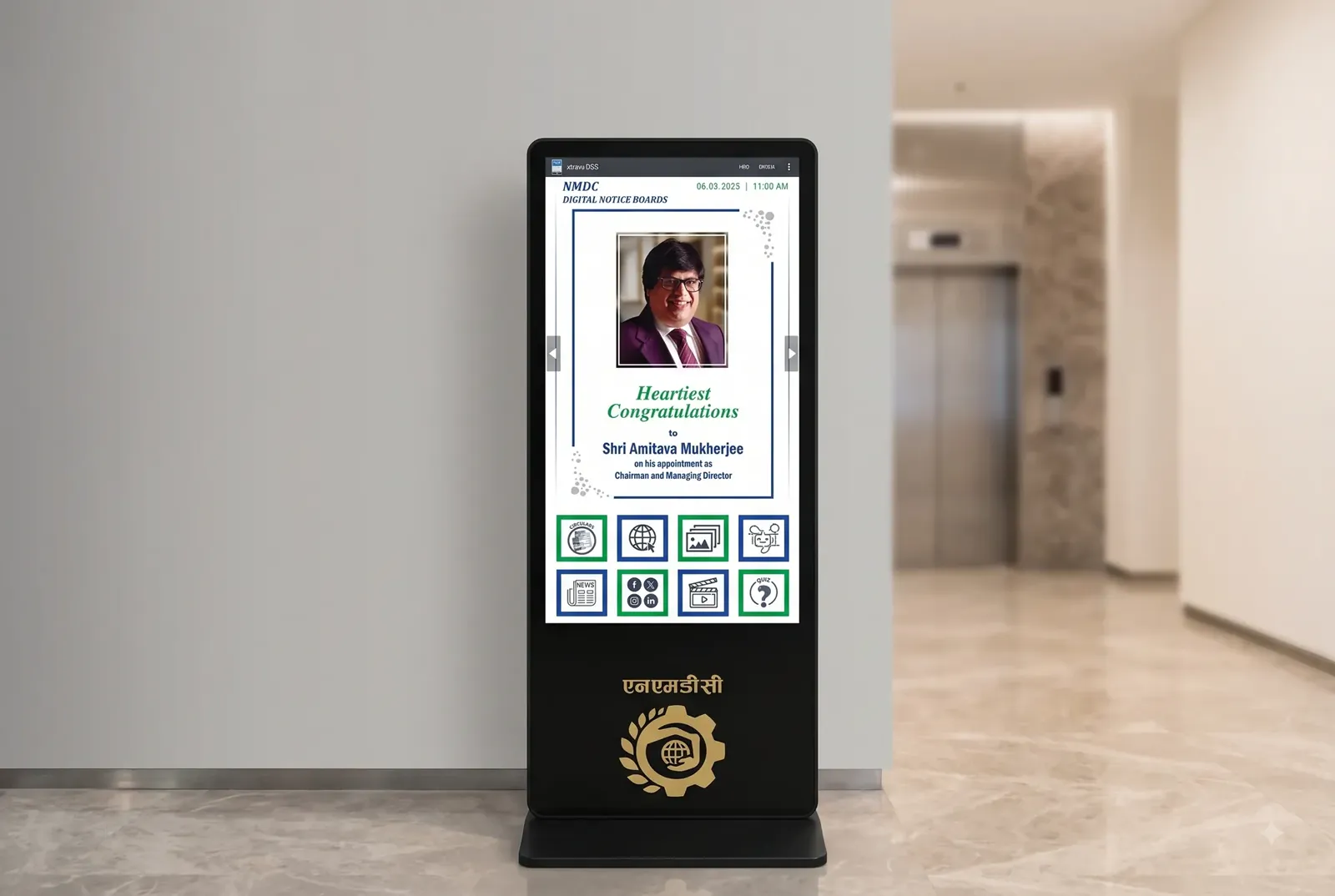An NMDC kiosk standee in an office lobby